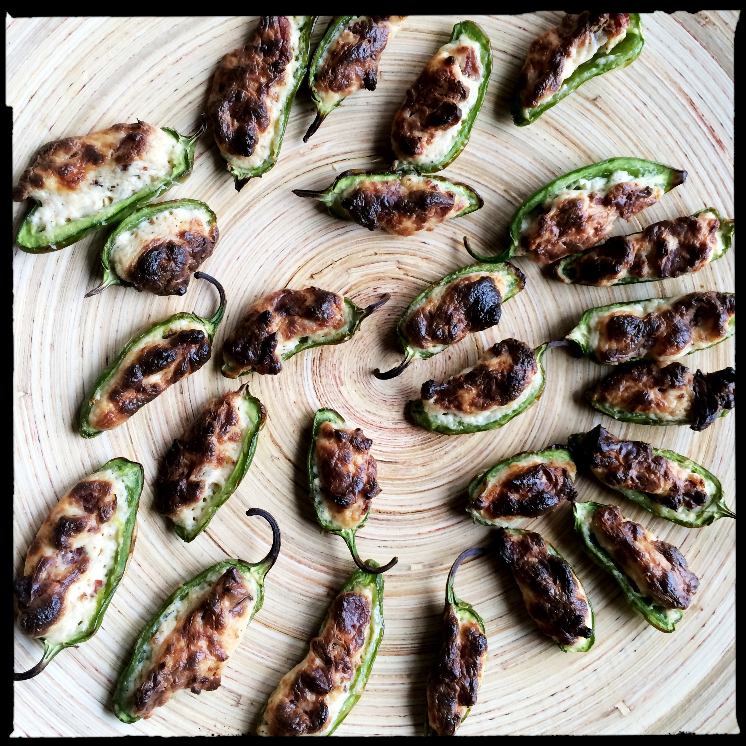 Cream cheese and bacon stuffed jalapeños for last night's summer feast with neighbors.